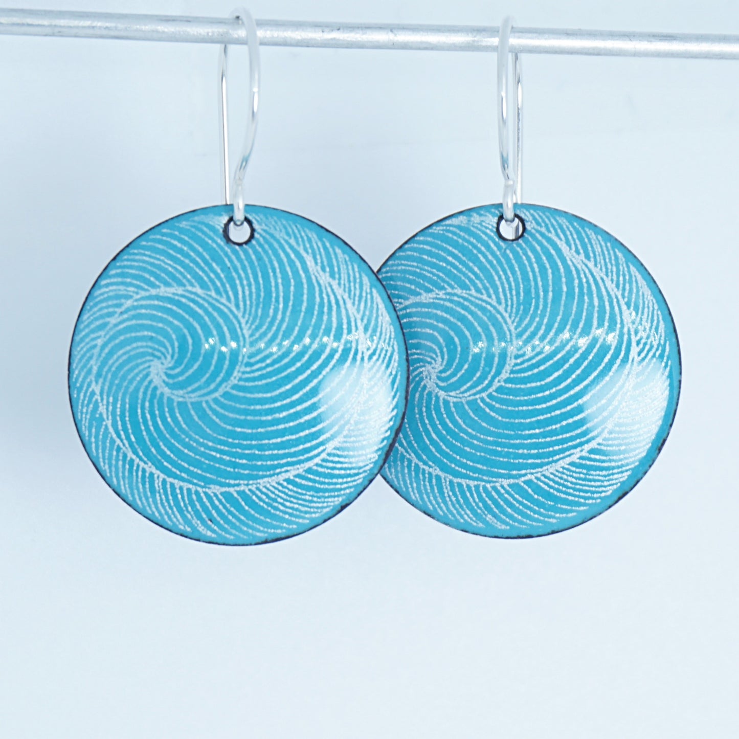 White Swirl Accents on Teal Green Enamel Disc Earrings