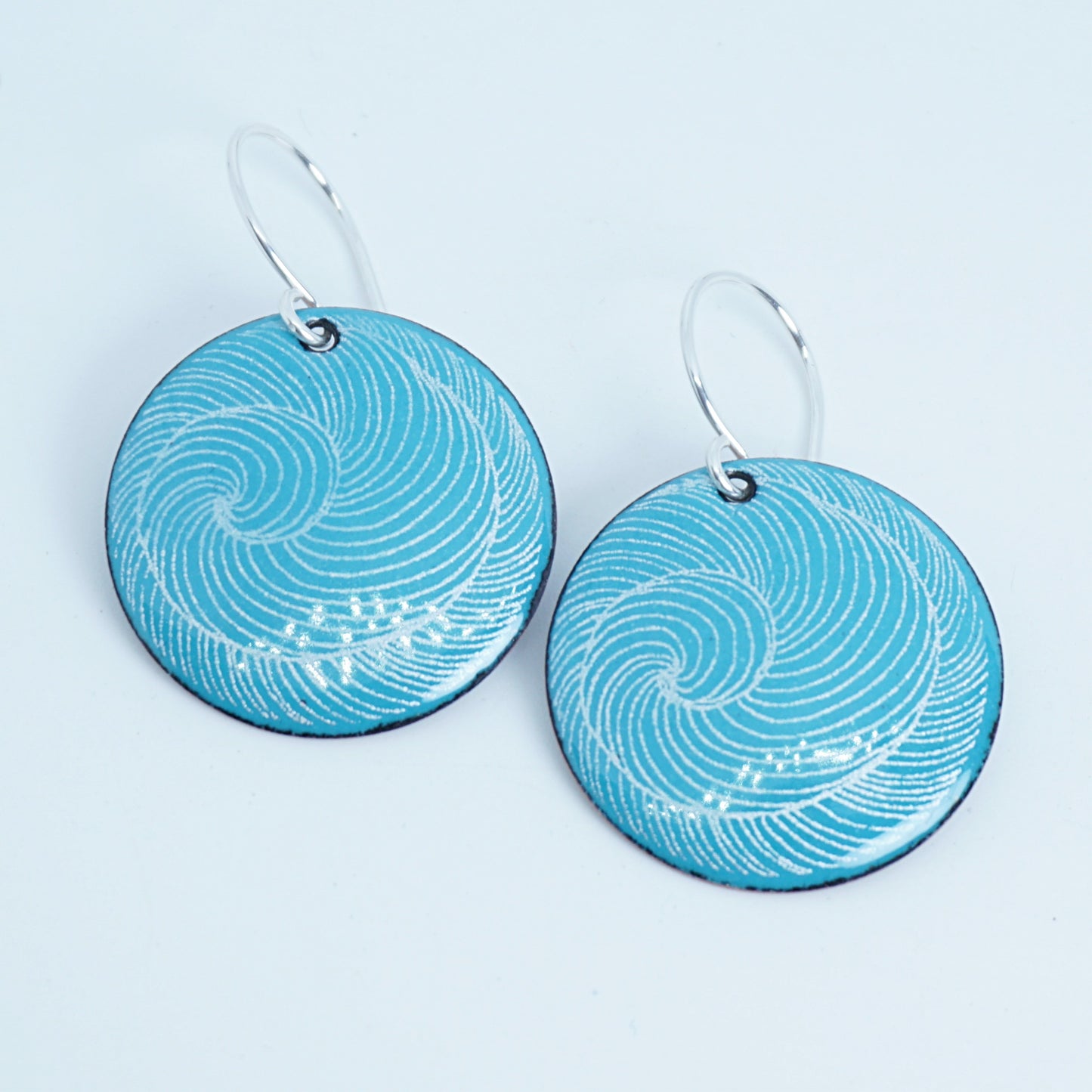 White Swirl Accents on Teal Green Enamel Disc Earrings