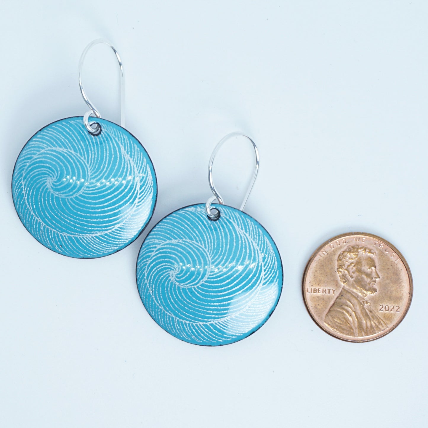White Swirl Accents on Teal Green Enamel Disc Earrings