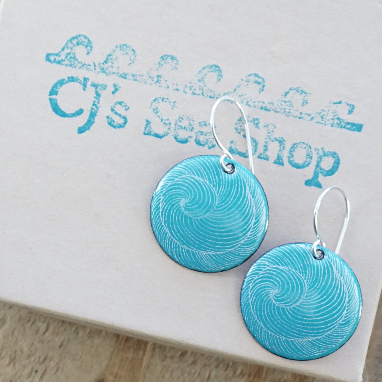 White Swirl Accents on Teal Green Enamel Disc Earrings