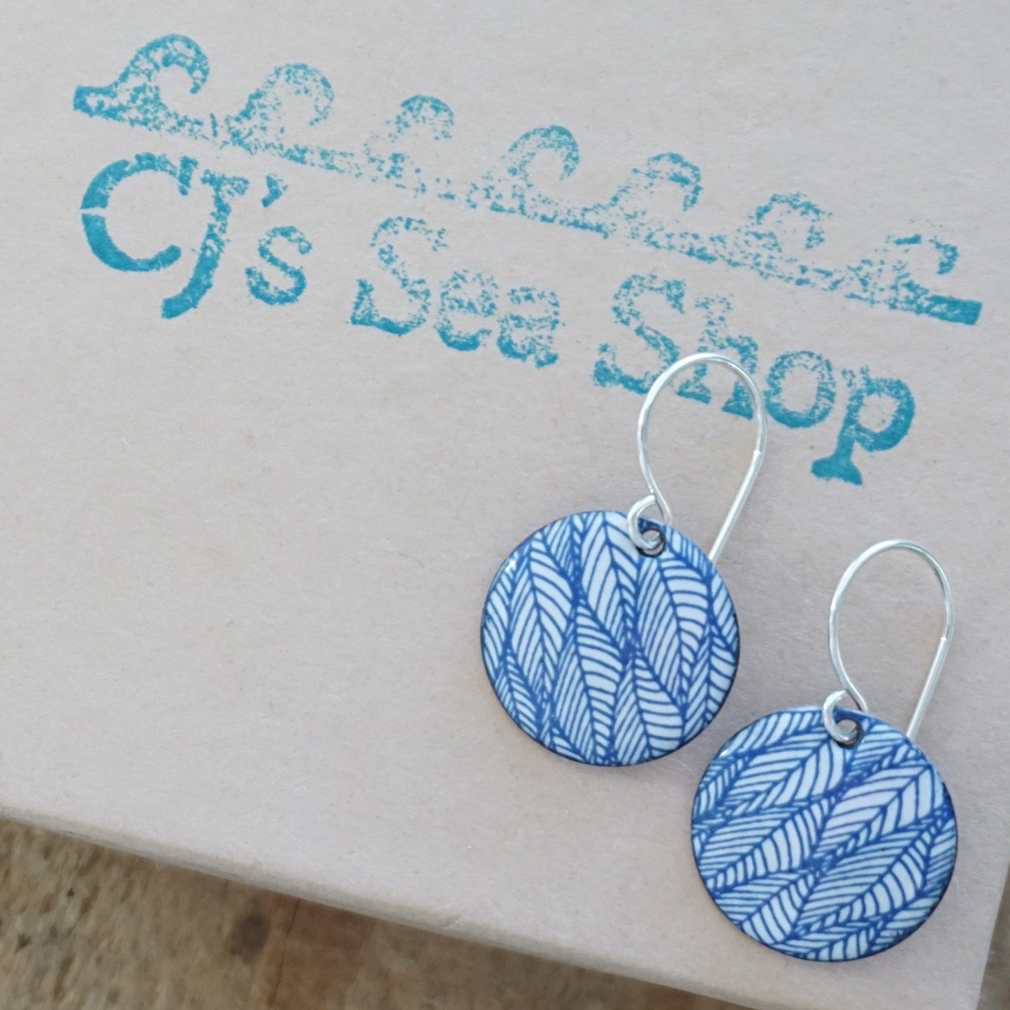 Blue Leaf Accents on White Enamel Disc Earrings