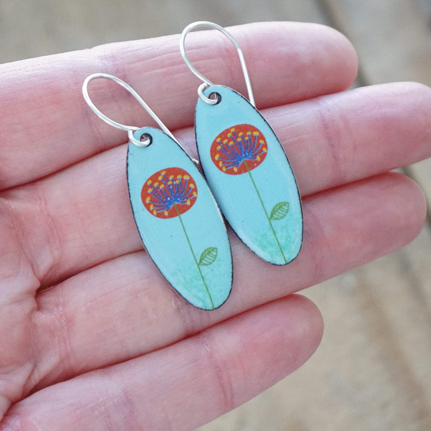 CLEARANCE Red and Blue Dandelions on Light Blue Oval Earrings