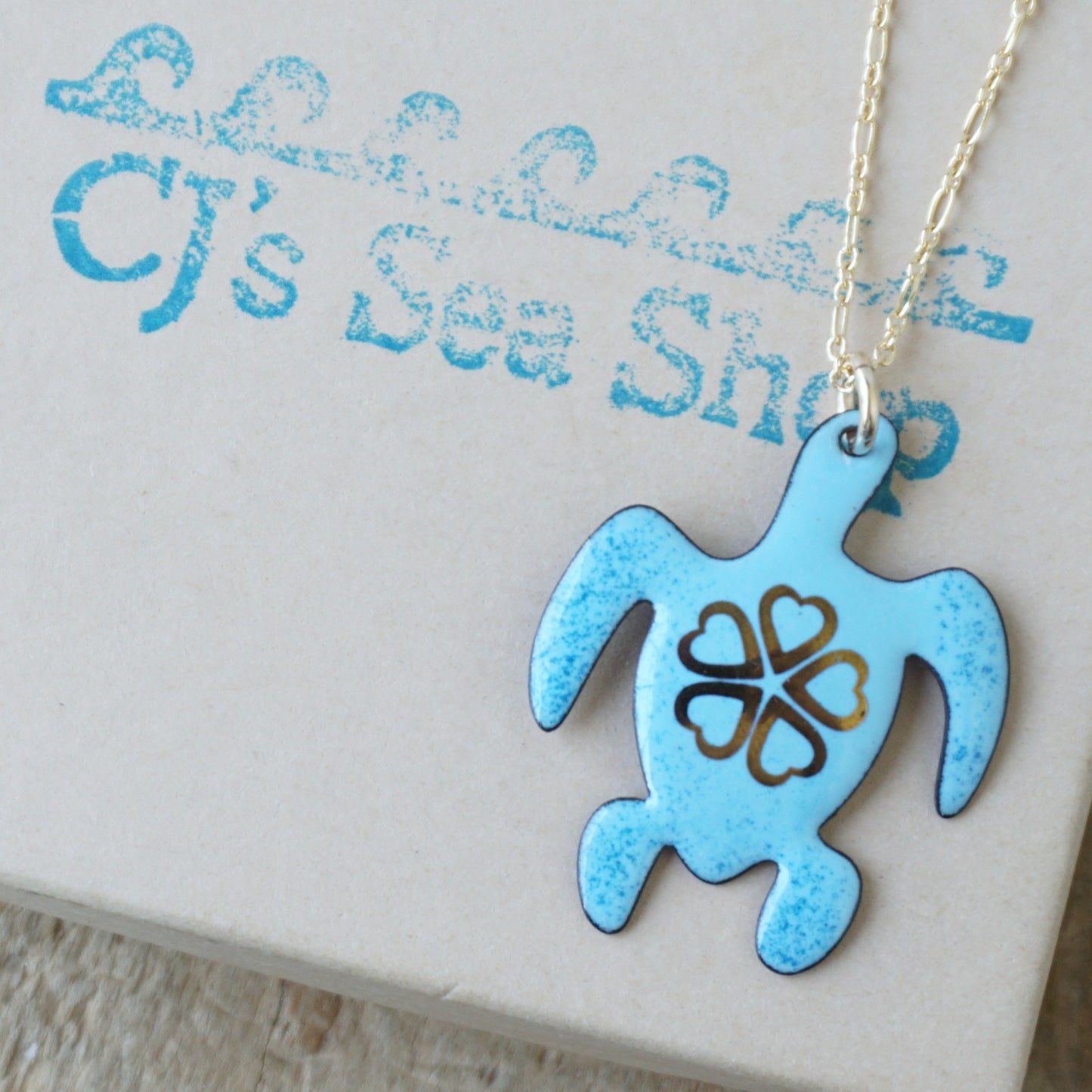 Gold Flower on Light Blue Enamel Turtle Necklace