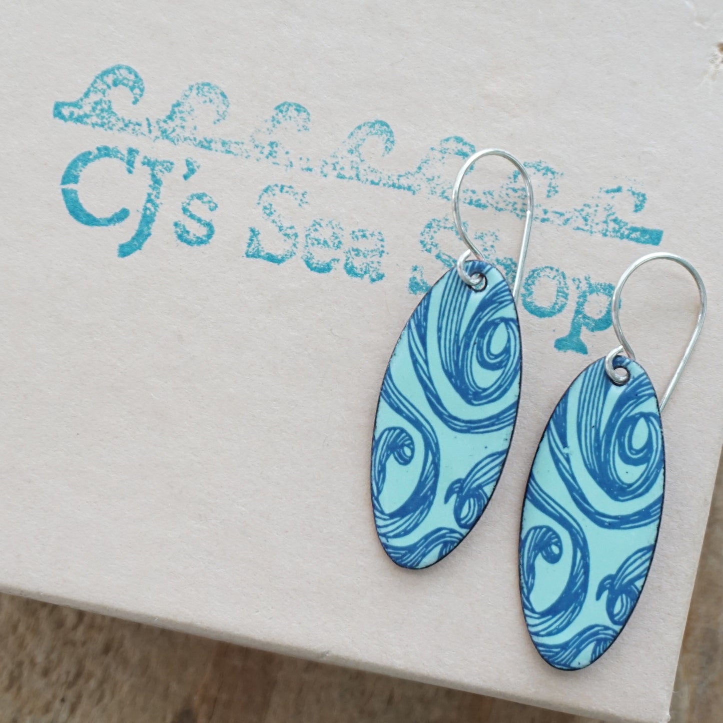 Blue Swirls on Seafoam Green Enamel Oval Earrings