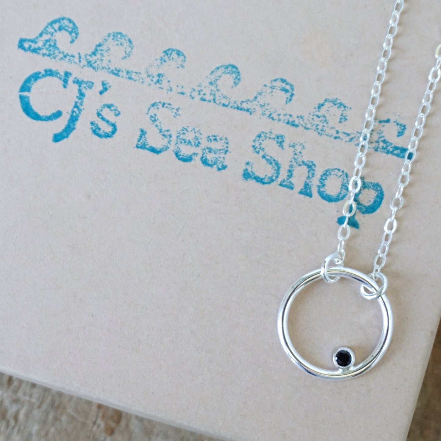 Sterling Silver Circle Necklace with Black Spinel