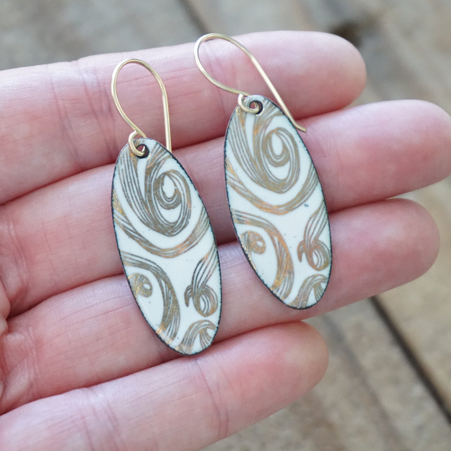Gold Swirl on White Enamel Oval Earrings