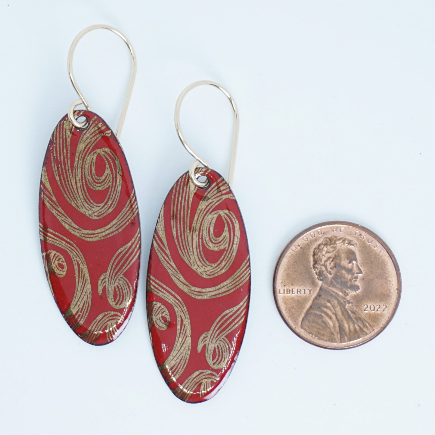 Gold Swirl on Red Enamel Oval Earrings