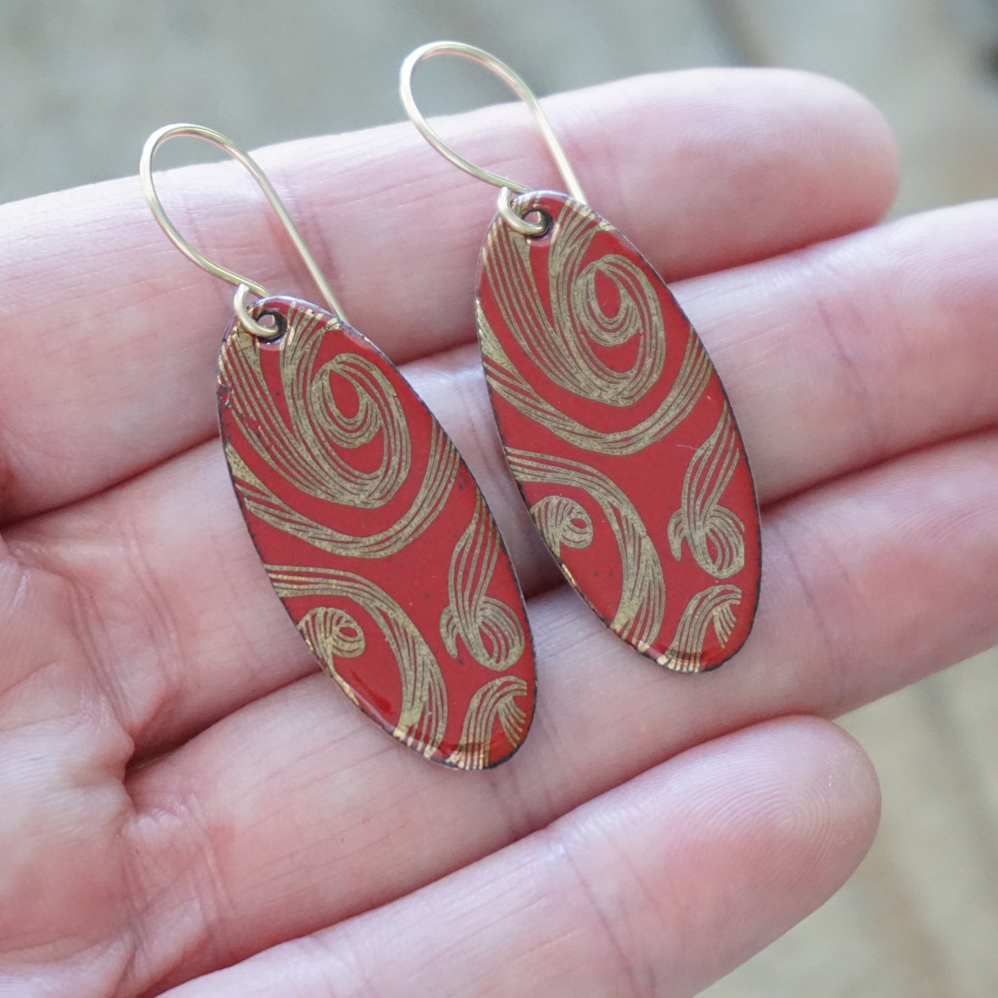 Gold Swirl on Red Enamel Oval Earrings