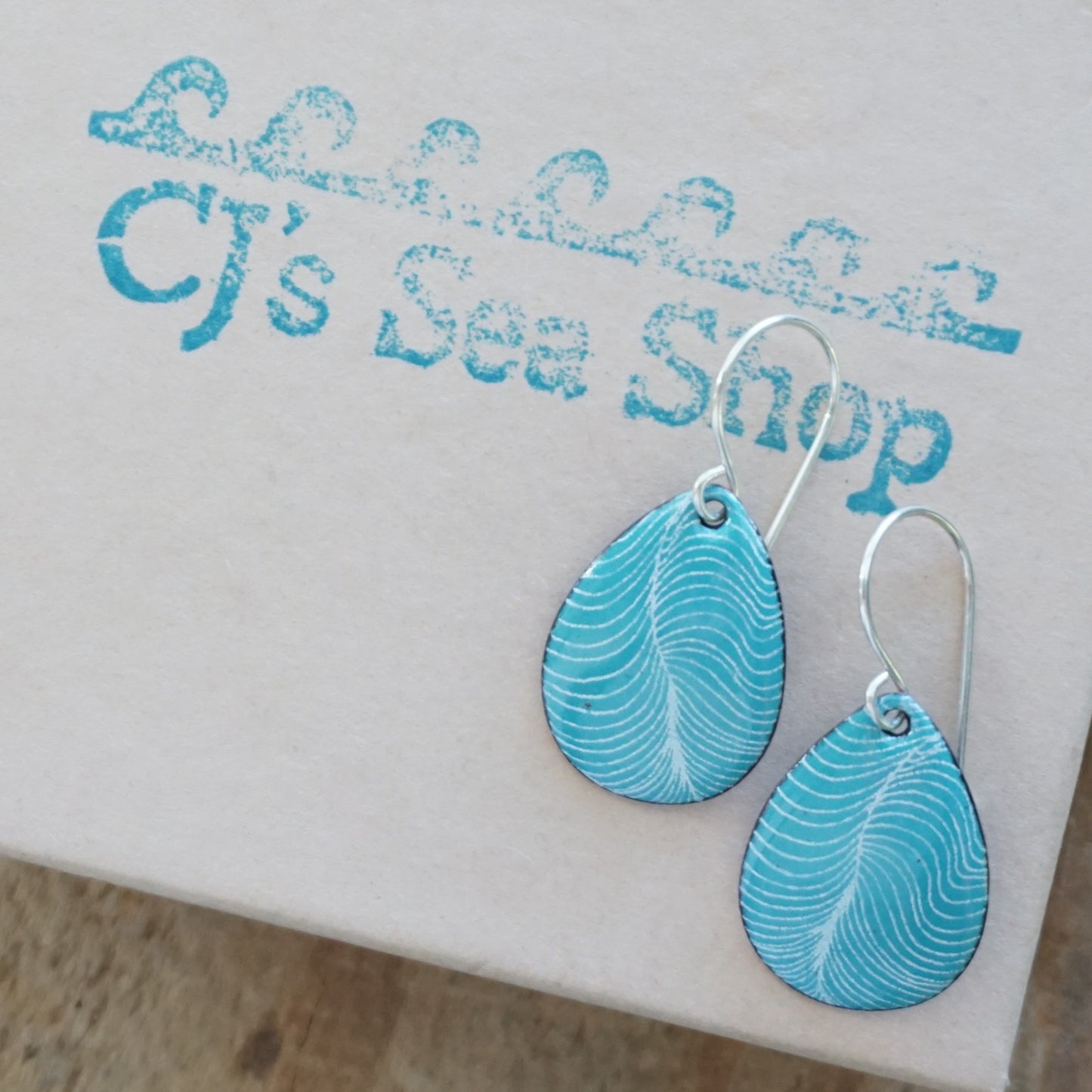 White Line Accents on Teal Green Enamel Teardrop Earrings