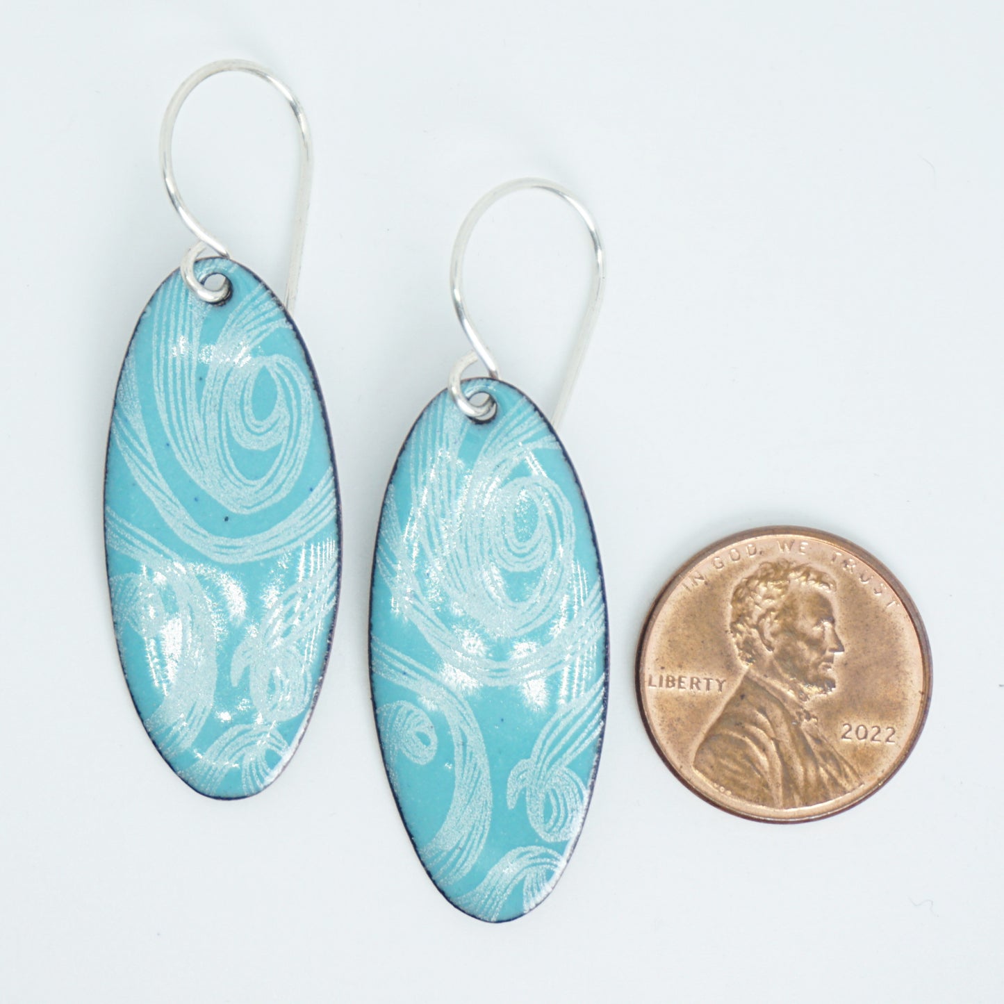 White Swirls on Light Teal Green Enamel Oval Earrings