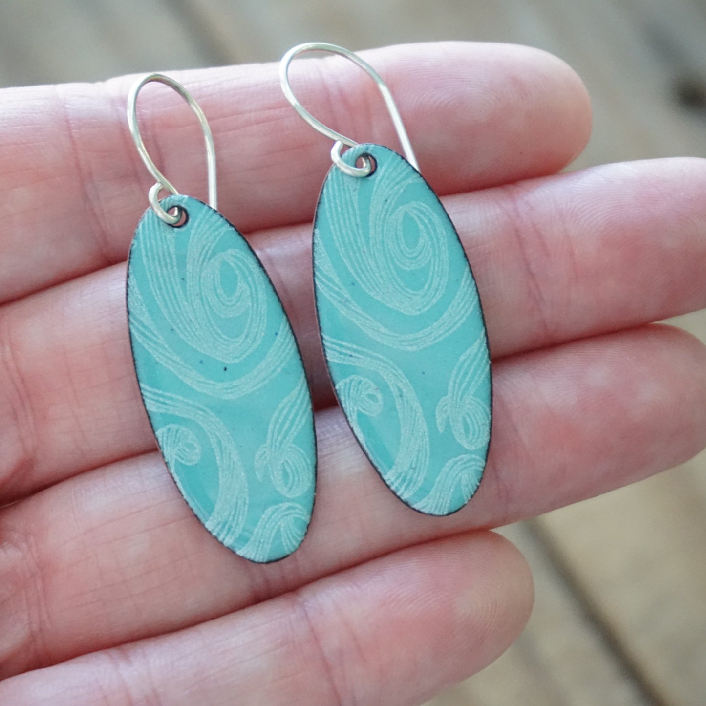 White Swirls on Light Teal Green Enamel Oval Earrings