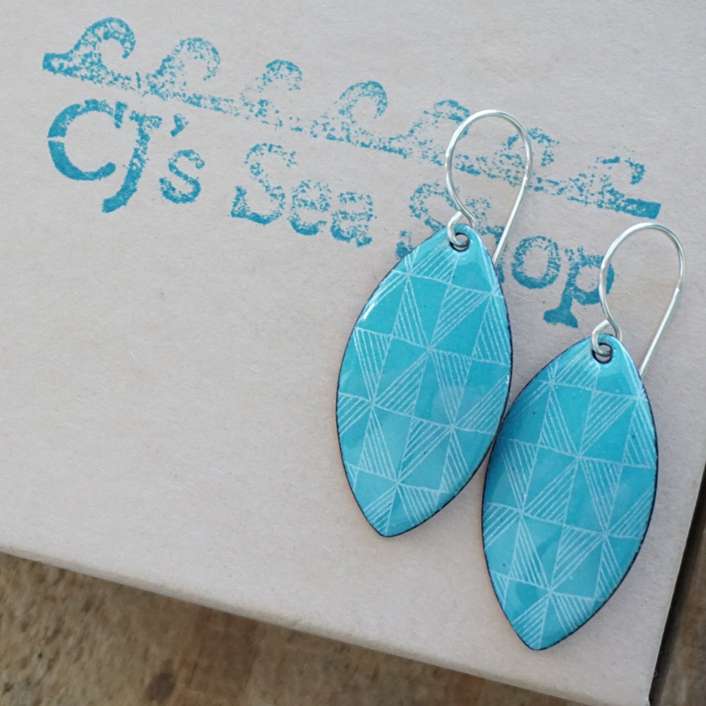 White Windmill Accents on Teal Green Enamel Marquis Earrings