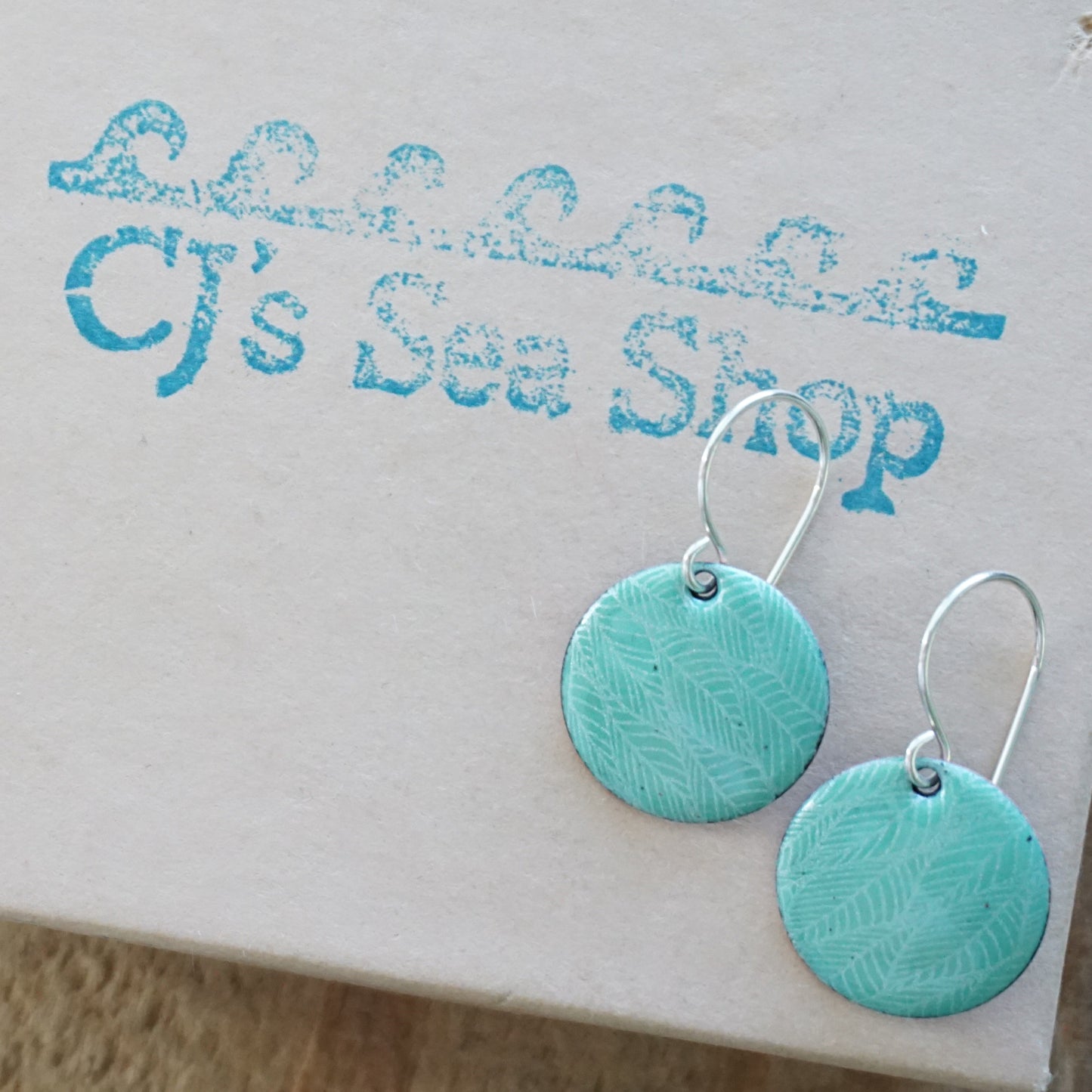 Green Enamel Disc Earrings with White Leaf Accents