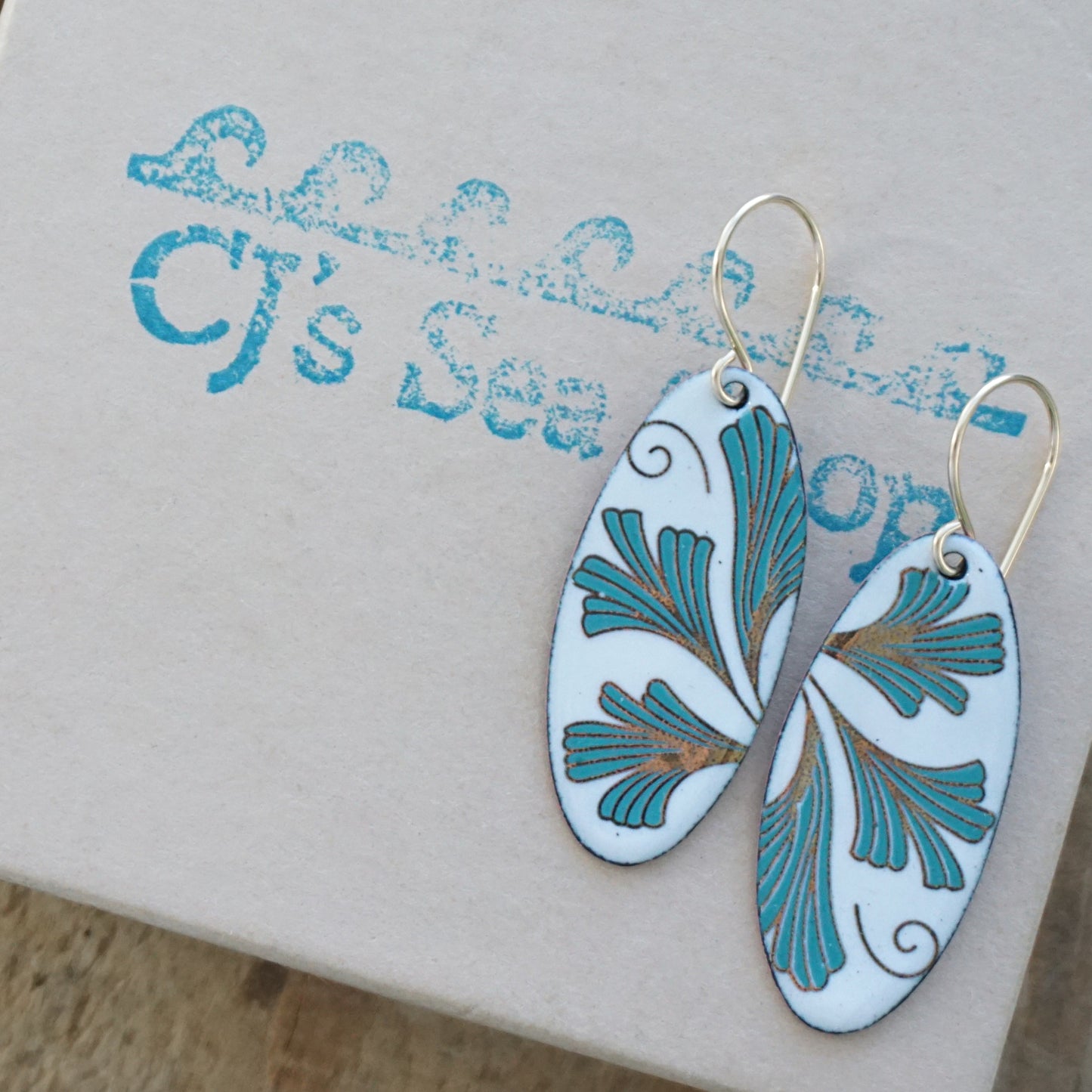White Enamel Oval Earrings with Gold and Green Leaves