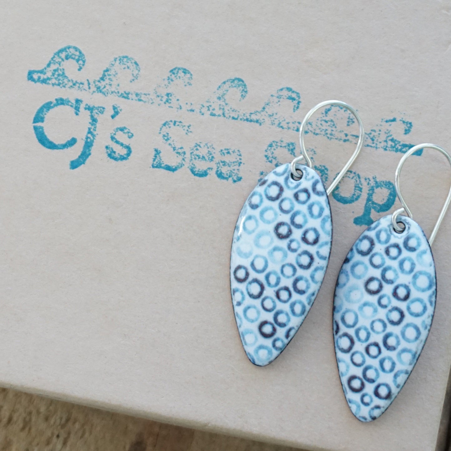 White Enamel Teardrop Earrings with Blue Bubbles