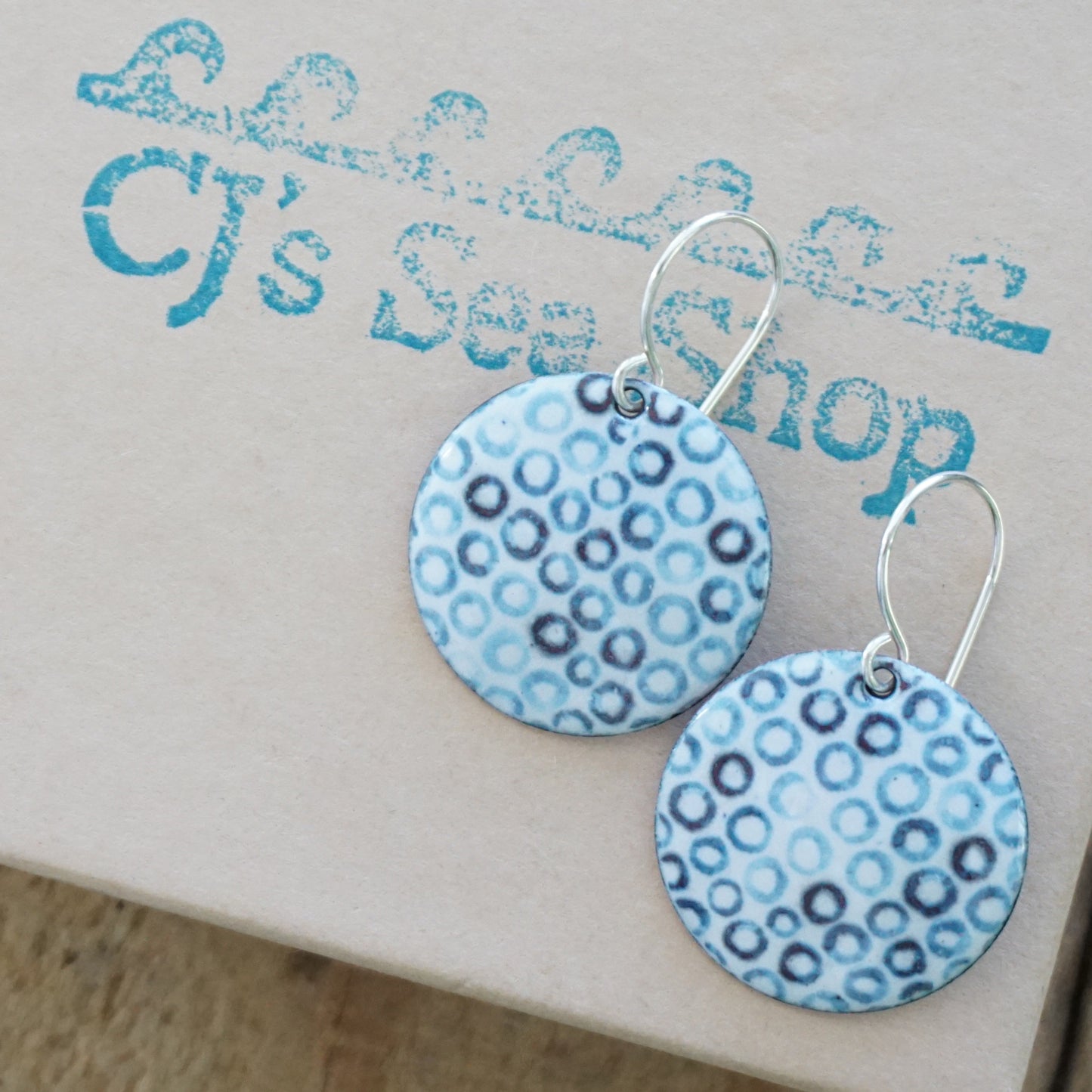 White Enamel Disc Earrings with Blue Bubbles