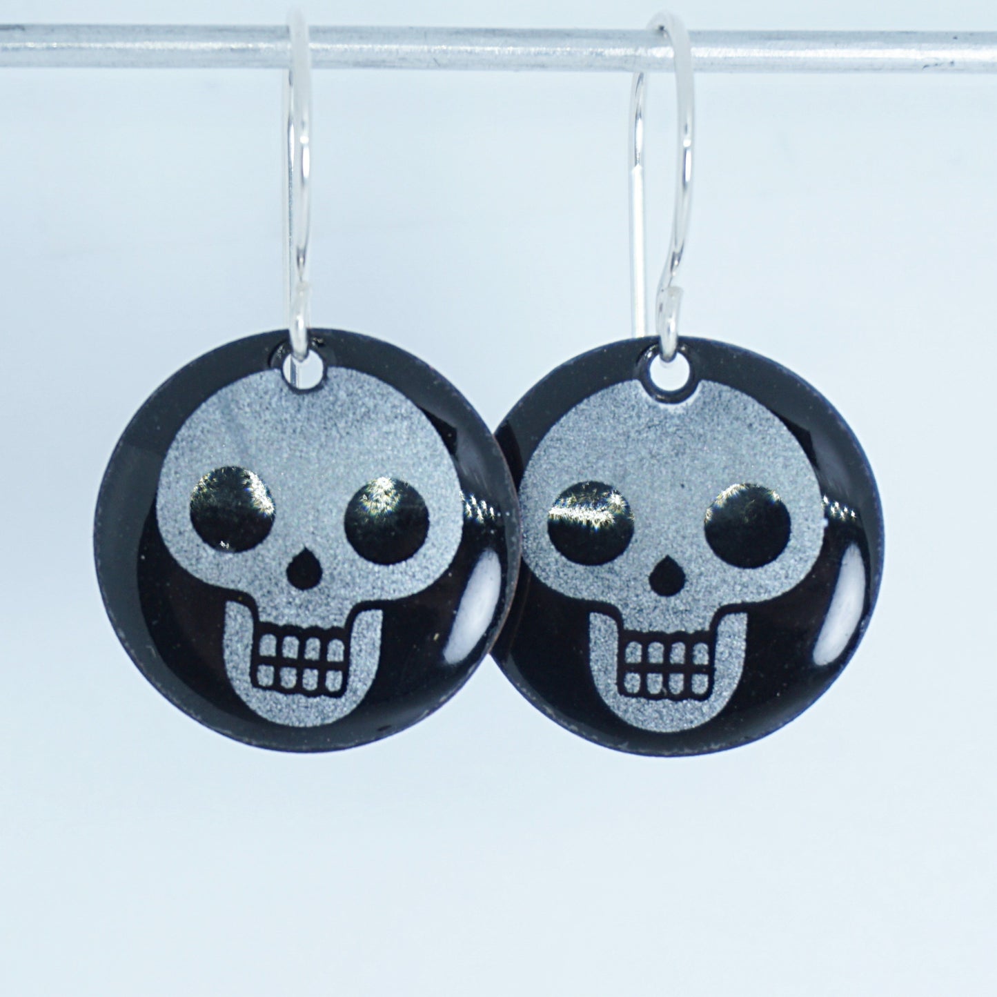 Skulls on Black Enamel Disc Earrings