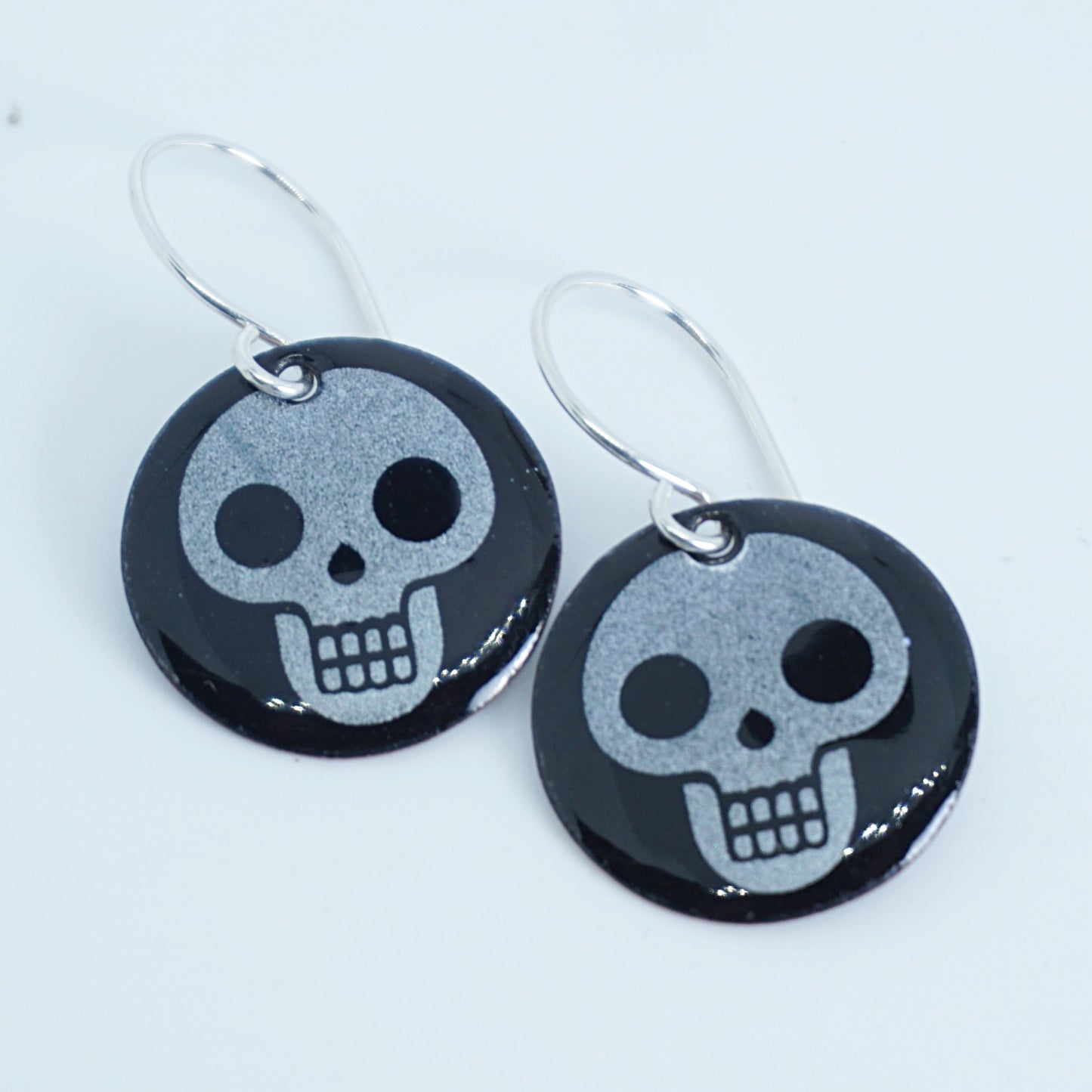 Skulls on Black Enamel Disc Earrings