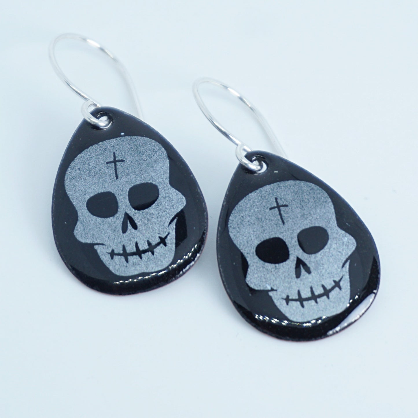 Skulls on Black Enamel Teardrop Earrings