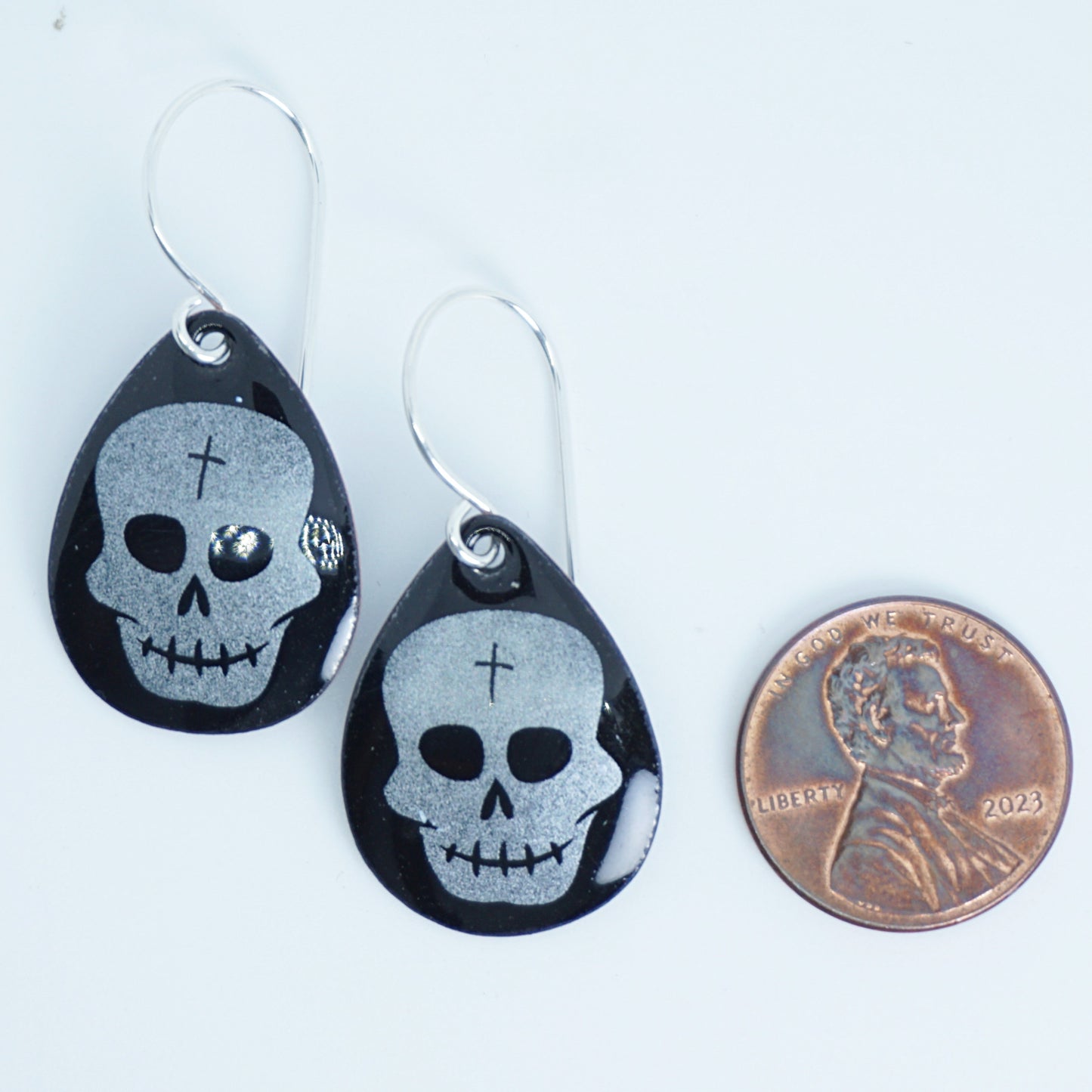 Skulls on Black Enamel Teardrop Earrings