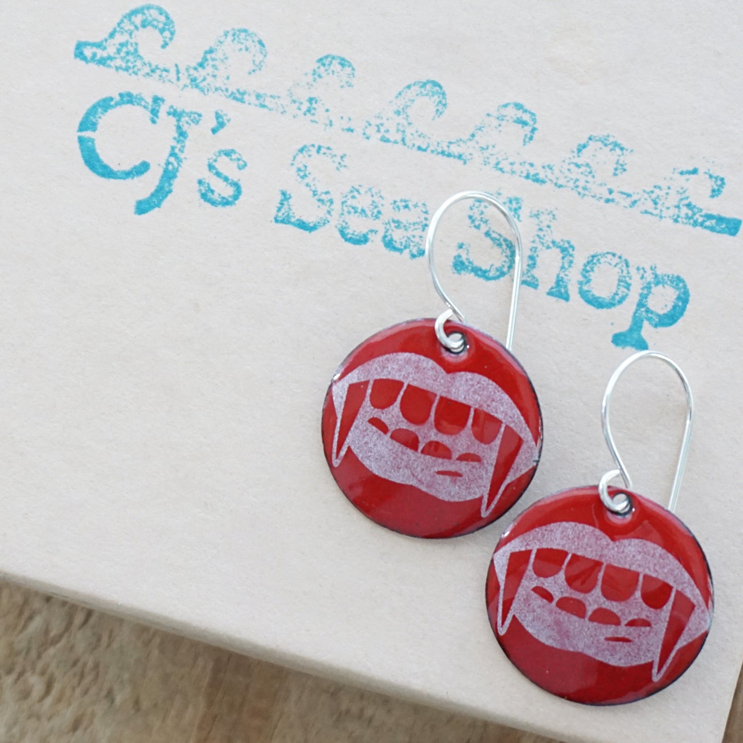 Vampire Teeth on Red Enamel Disc Earrings