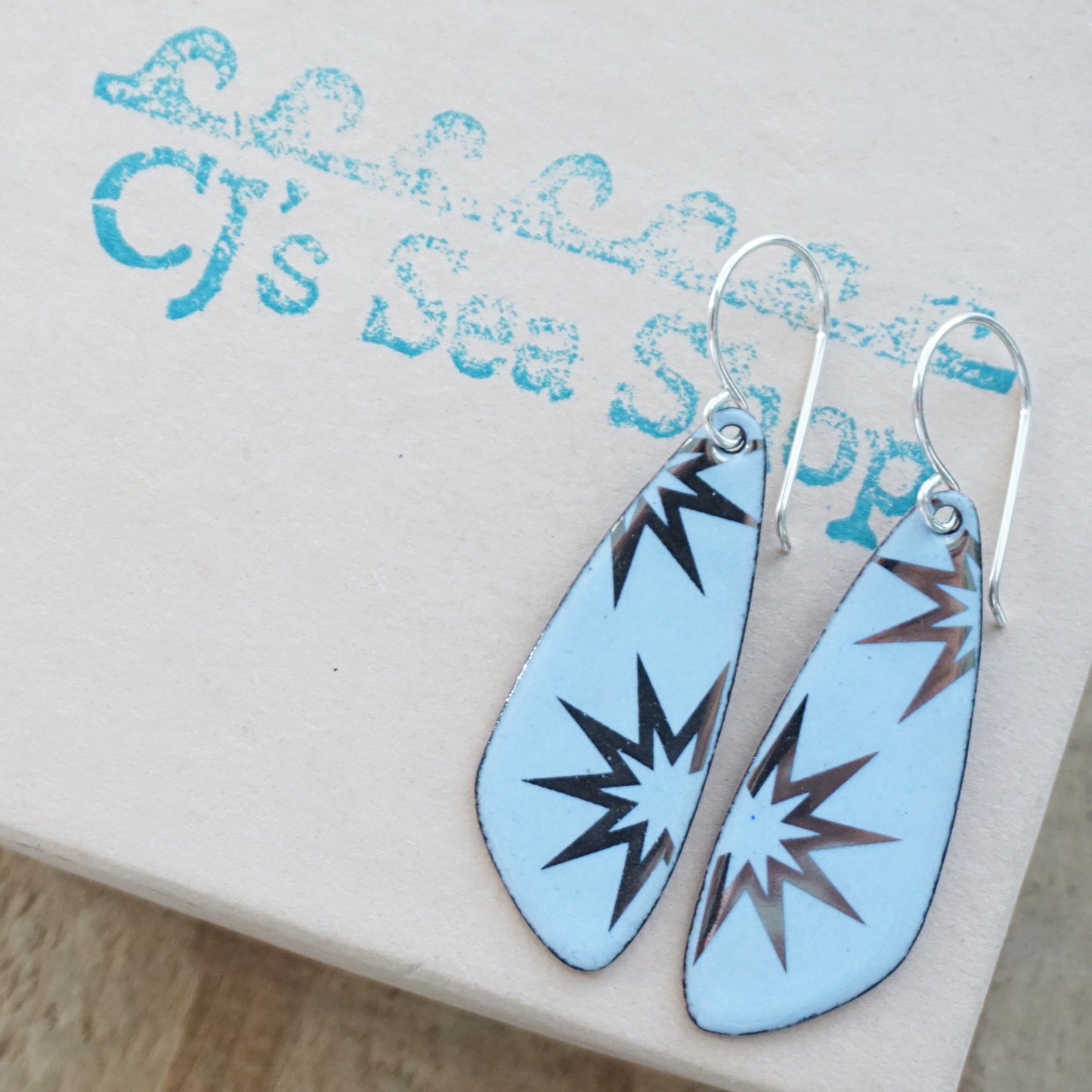 Silver Snowflakes on Pale Blue Enamel Teardrop Earrings