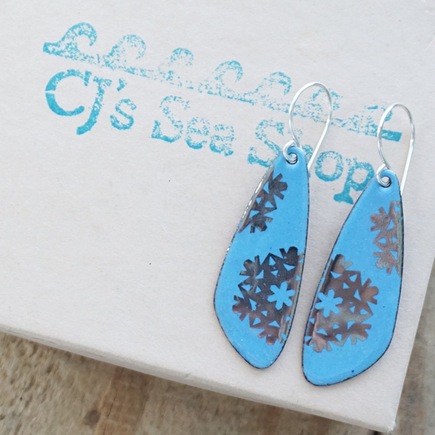 Silver Snowflakes on Blue Enamel Teardrop Earrings