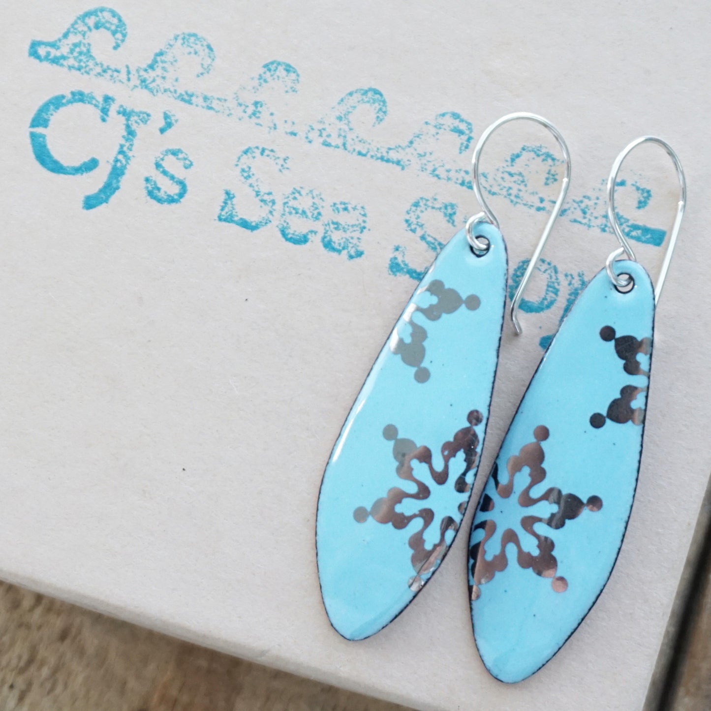 Silver Snowflakes on Light Blue Enamel Teardrop Earrings