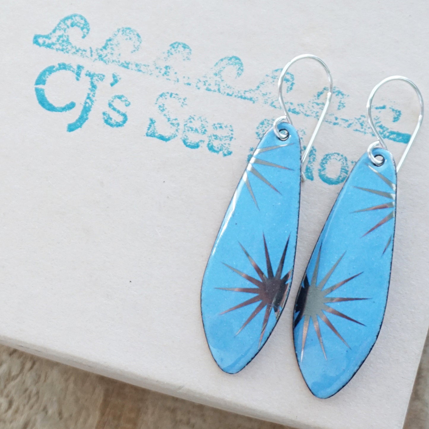 Silver Snowflakes on Blue Enamel Teardrop Earrings