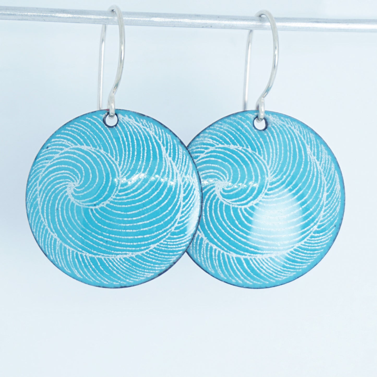 White Swirl Accents on Teal Green Enamel Disc Earrings