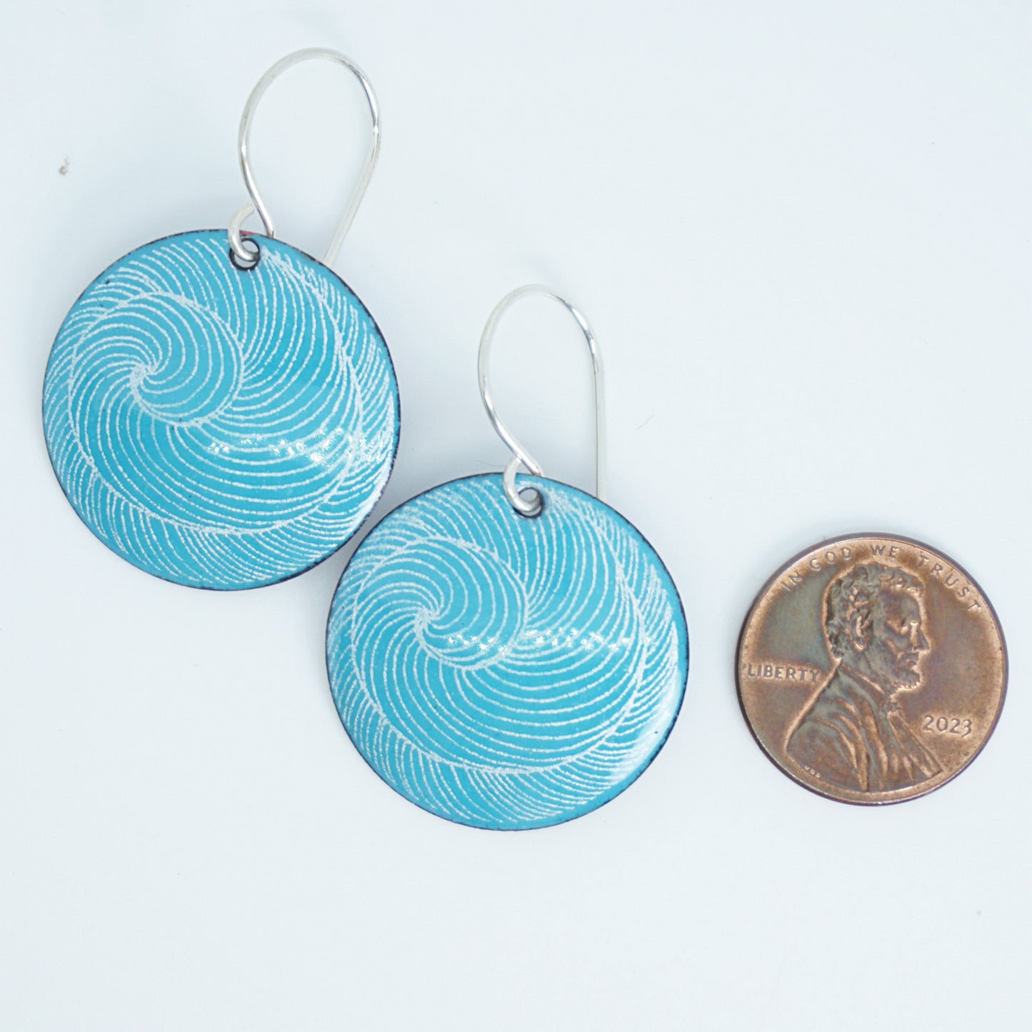 White Swirl Accents on Teal Green Enamel Disc Earrings