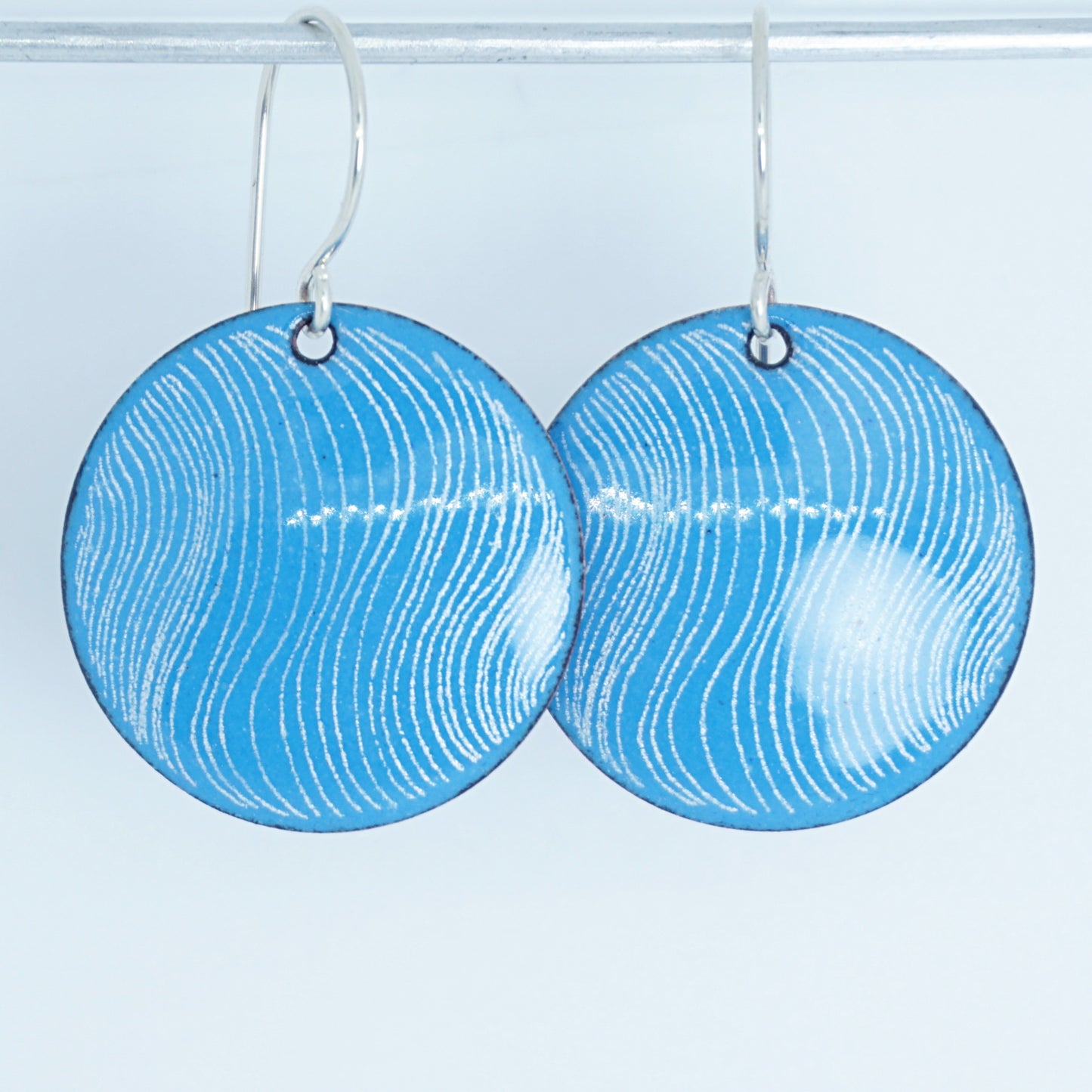 White Wavy Line Accents on Aqua Blue Enamel Disc Earrings