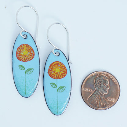 Red and Yellow Daisies on Light Blue Oval Earrings