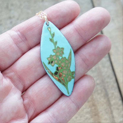 Gold and Green Flowers on Light Blue Enamel Pendant