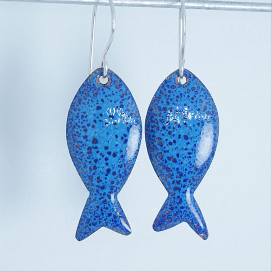 blue enamel fish shaped earrings, against a white background