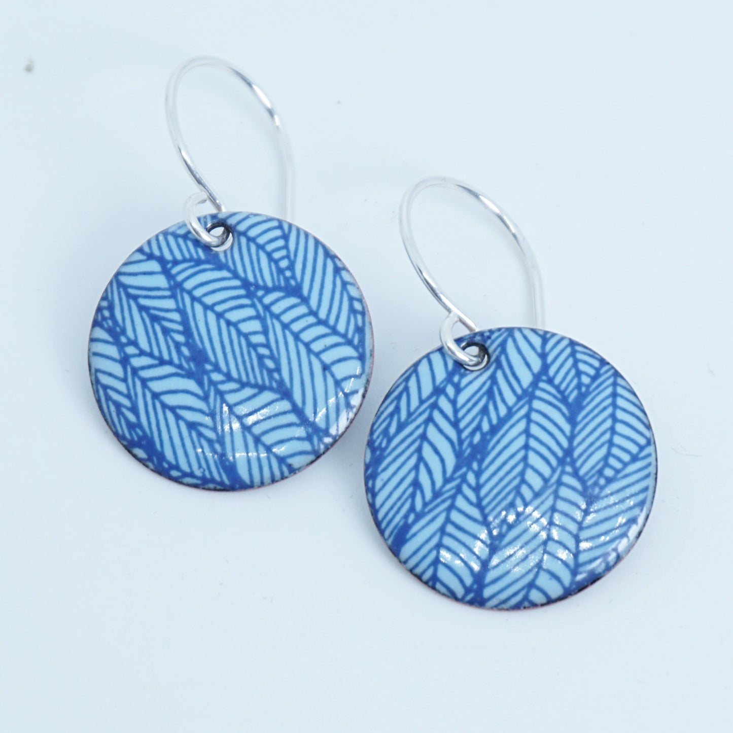 Blue Leaf Accents on Light Blue Enamel Disc Earrings