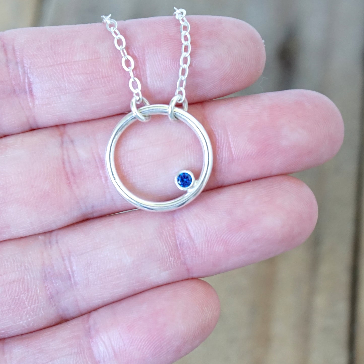 Sterling Silver Circle Necklace with Sapphire Blue Spinel