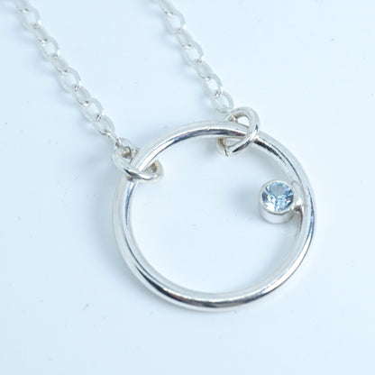 Sterling Silver Circle Necklace with Aquamarine Colored Spinel