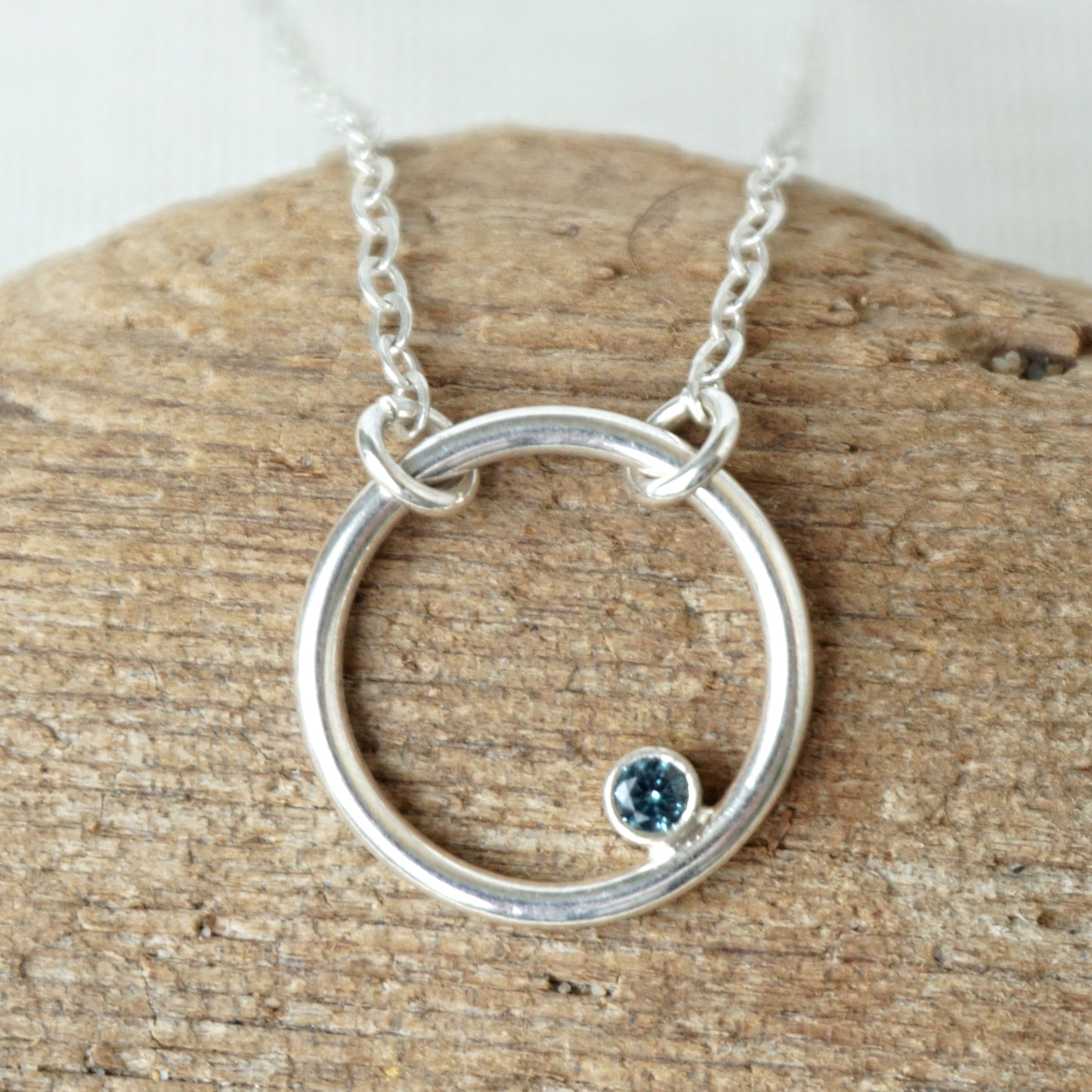 Sterling Silver Circle Necklace with Topaz Colored Zircon