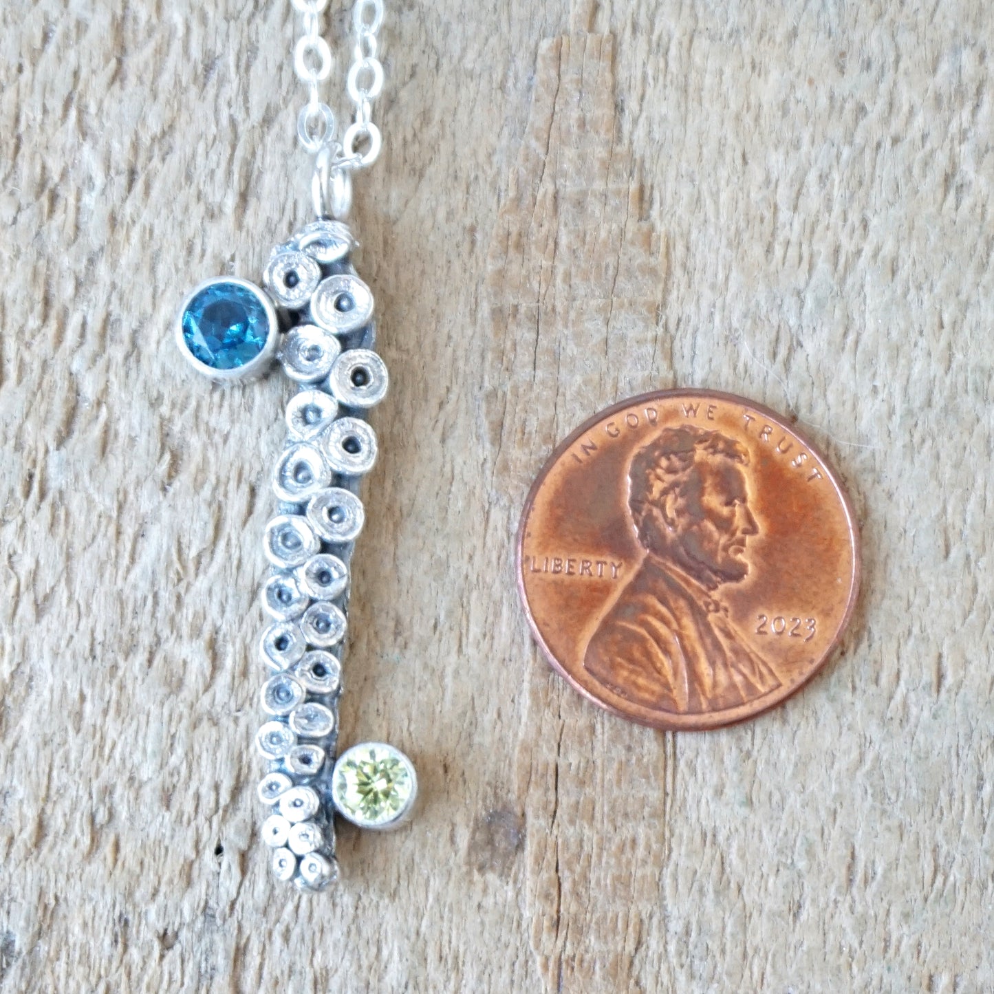 Sterling Silver Octopus Tentacle and Topaz Blue and Peridiot Green Cubic Zirconia Pendant