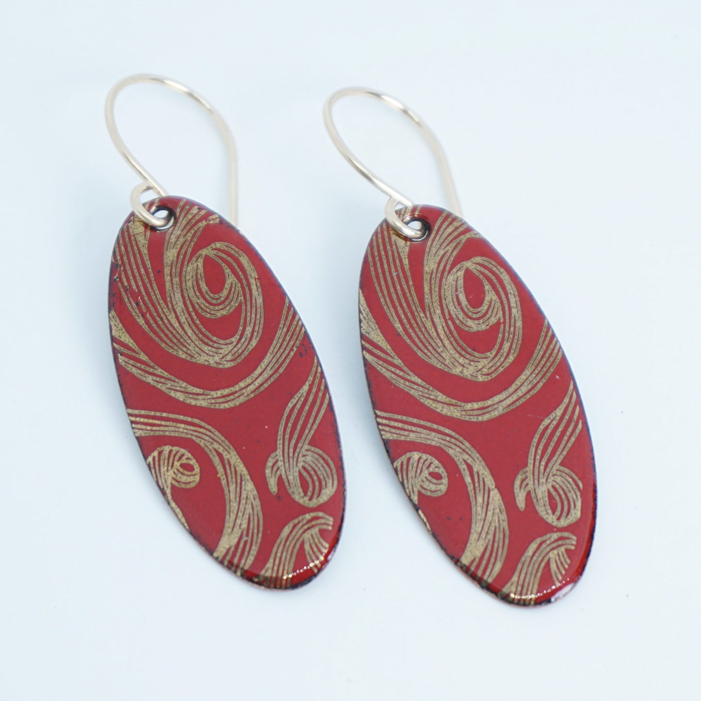 Gold Swirl on Red Enamel Oval Earrings