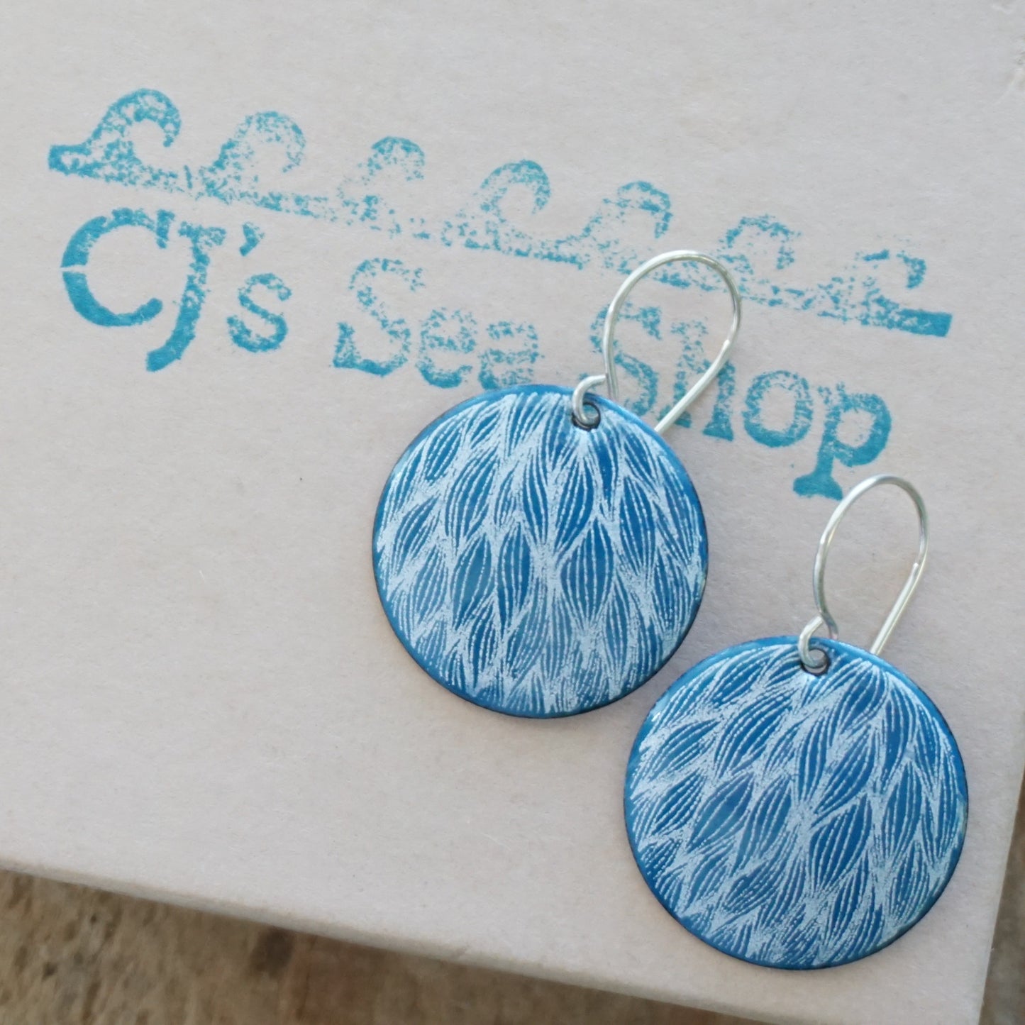 White Leaf Accents on Peacock Teal Enamel Disc Earrings