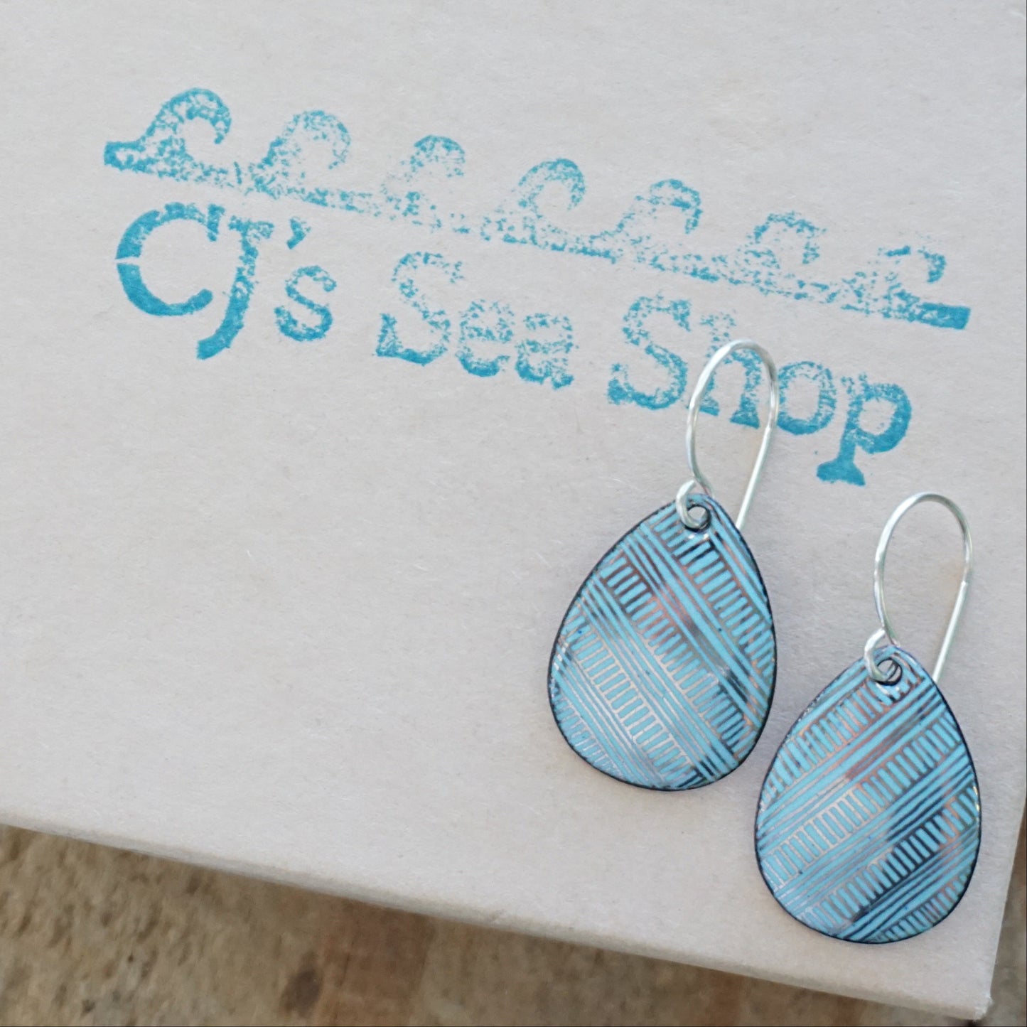 Silver Accents on Light Blue Enamel Teardrop Earrings