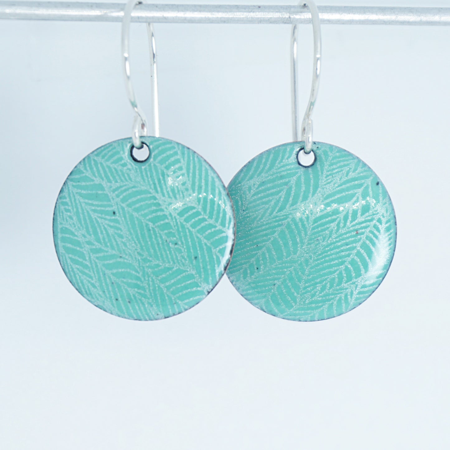 Green Enamel Disc Earrings with White Leaf Accents