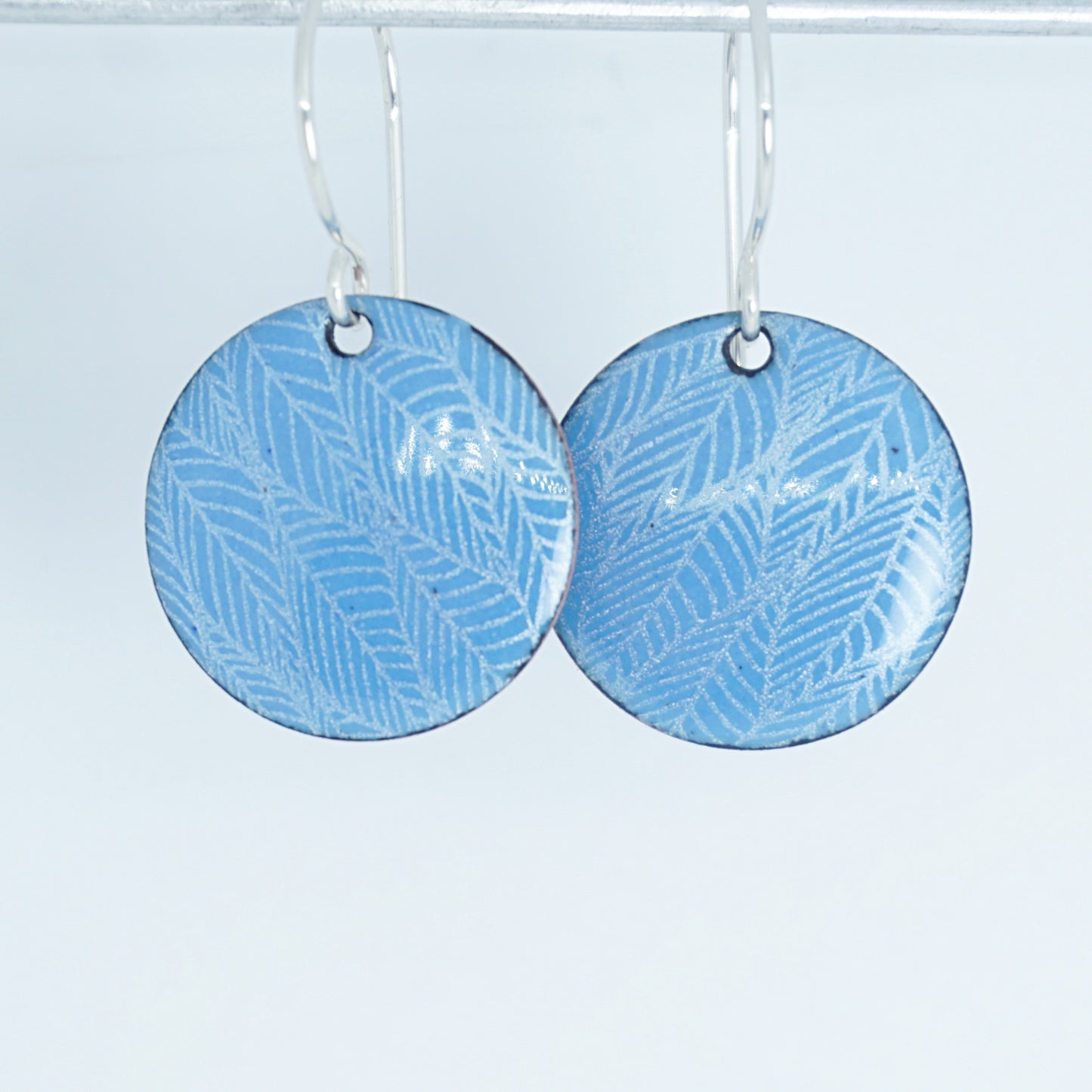 Blue Enamel Disc Earrings with White Leaf Accents