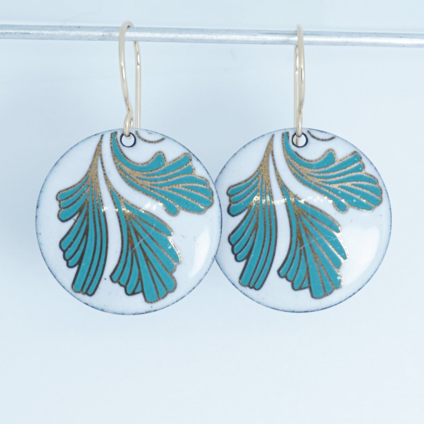 White Enamel Disc Earrings with Gold and Green Leaves