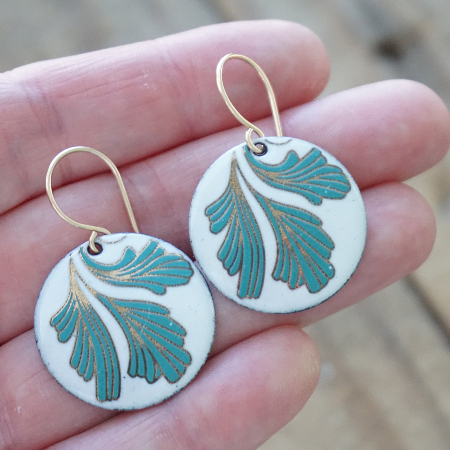 White Enamel Disc Earrings with Gold and Green Leaves