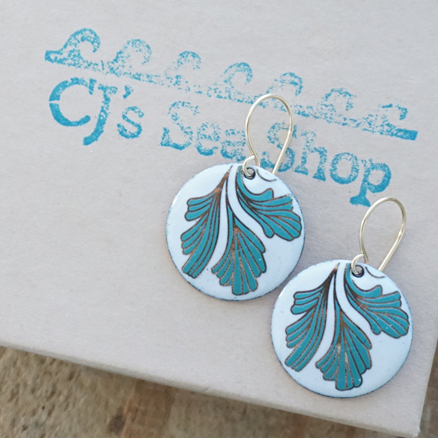 White Enamel Disc Earrings with Gold and Green Leaves