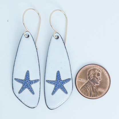 White Enamel Teardrop Earrings with Blue and Gold Starfish