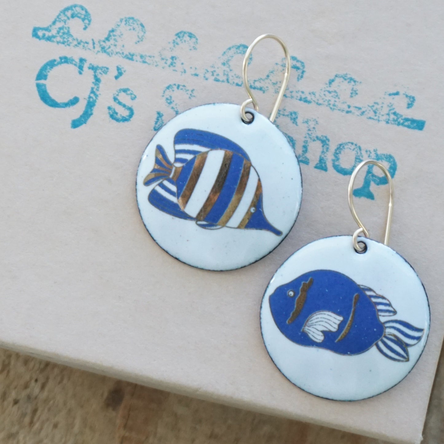 White Enamel Disc Earrings with Blue and Gold Fish
